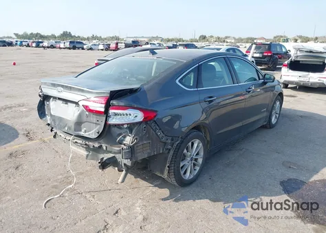 2019 Ford Fusion Hybrid Sel z USA, uszkodzony, nr VIN 3FA6P0MU2KR100564